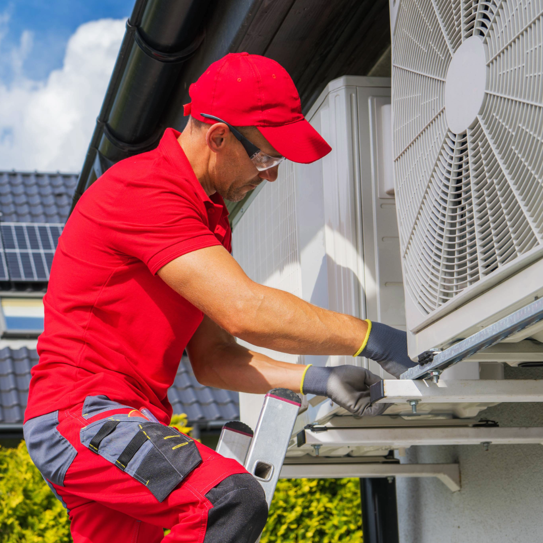 a man installing a heater