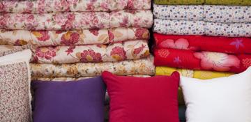 Colourful cushions and bedding