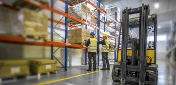 Men in warehouse