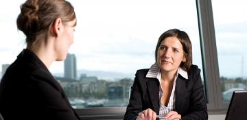 Women talking in an office
