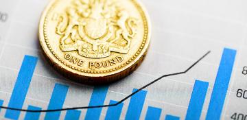 Graphic showing a pound coin on top of a. growth chart