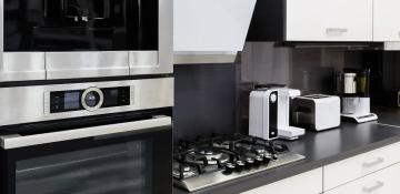 kitchen with appliances on the platform 